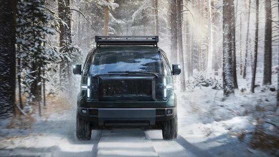 Un pick-up trcuk Canoo appositamente costruito con un letto da 8 piedi con ampio spazio interno